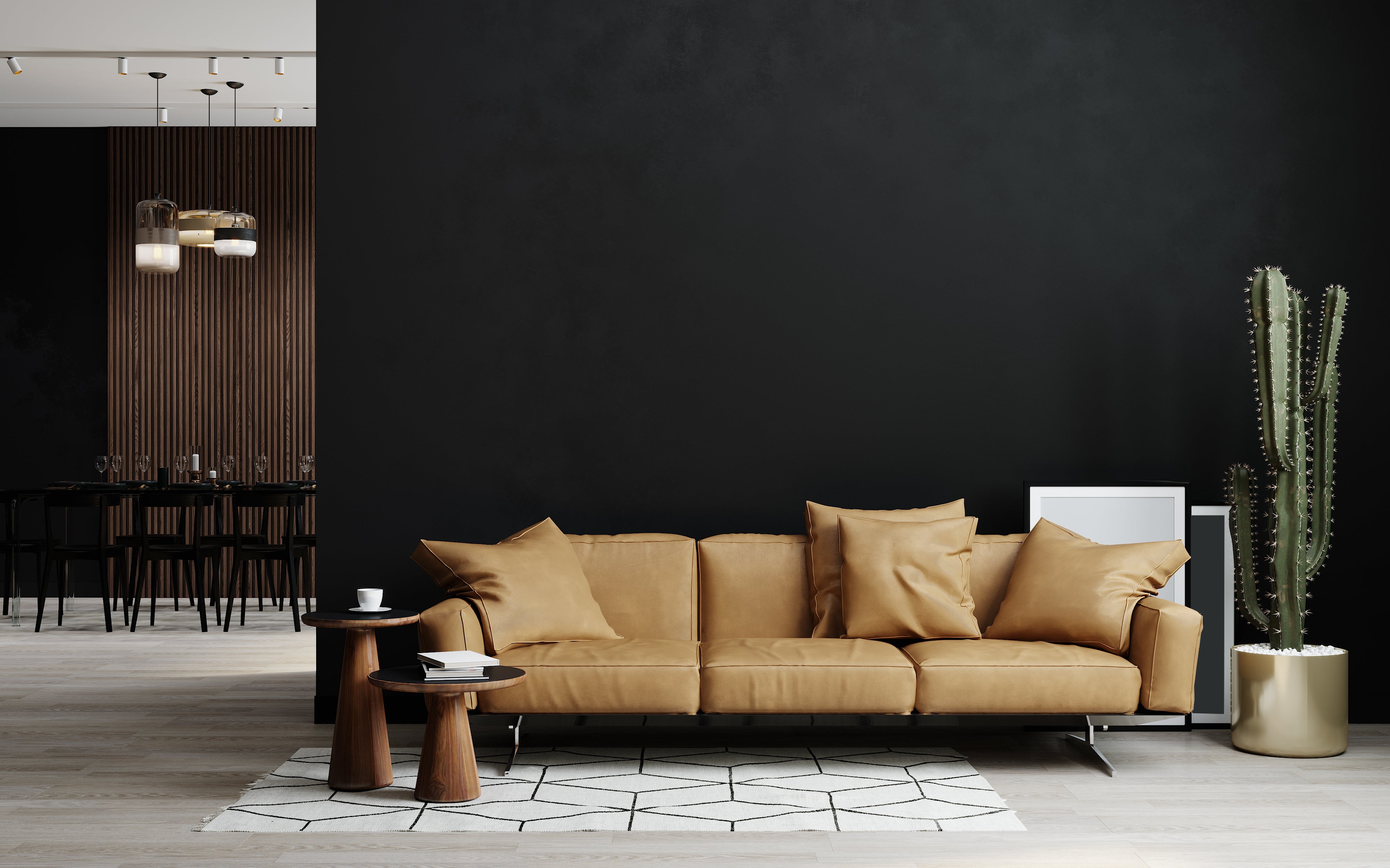 brown leather couch in black living room